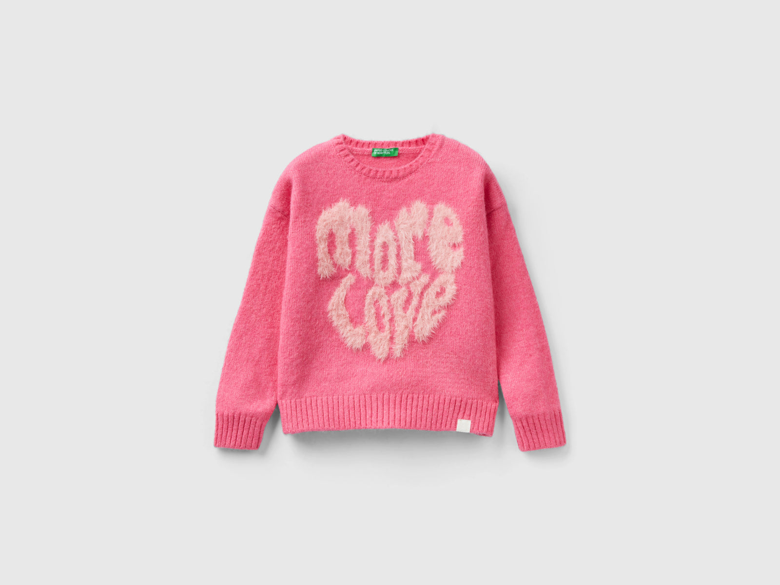 Maglia boxy fit con intarsio da bambina fucsia | Benetton Outlet