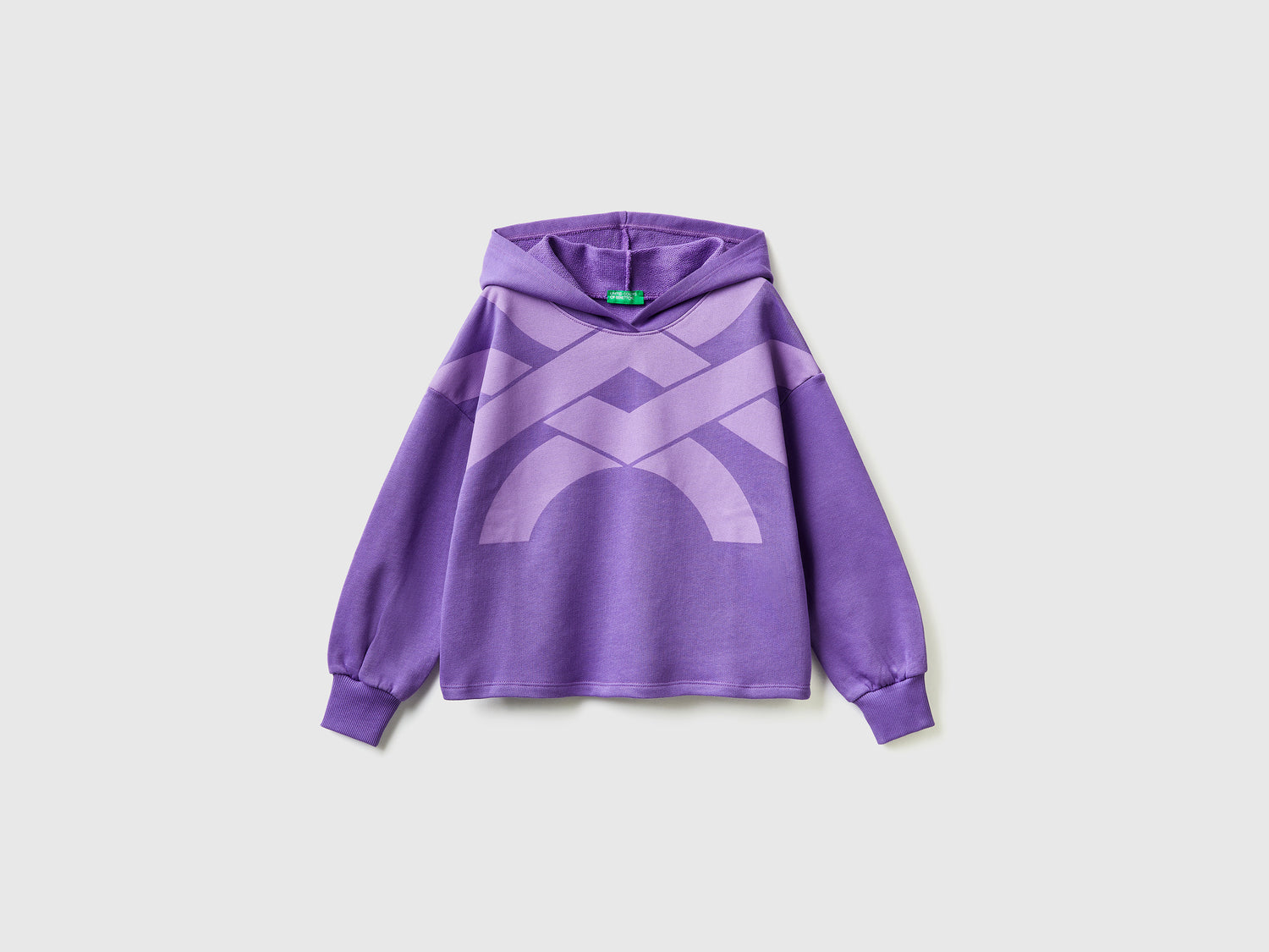 Felpa over fit con cappuccio da bambina viola | Benetton Outlet