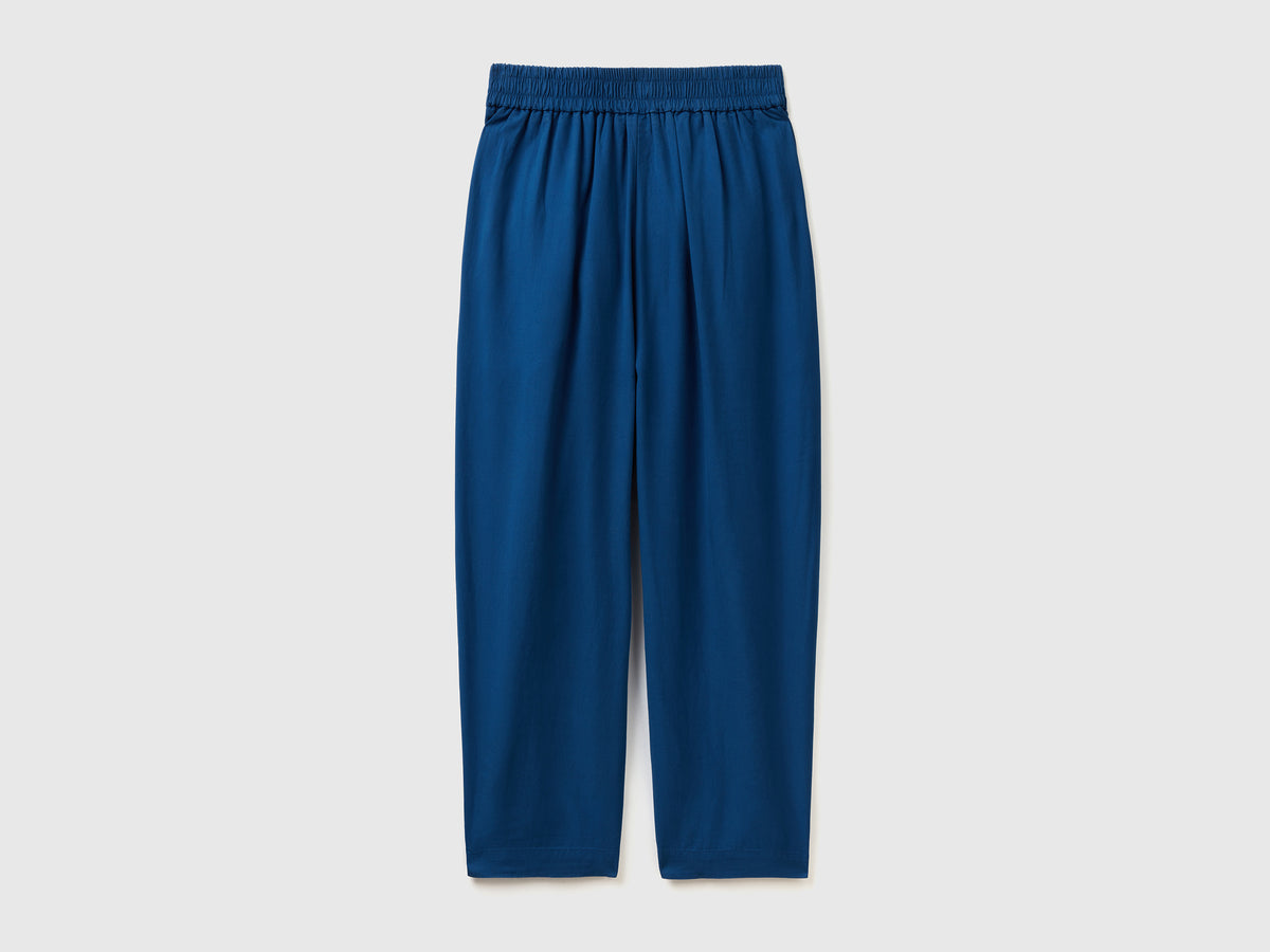 Pantaloni lunghi cropped in tessuto fluido