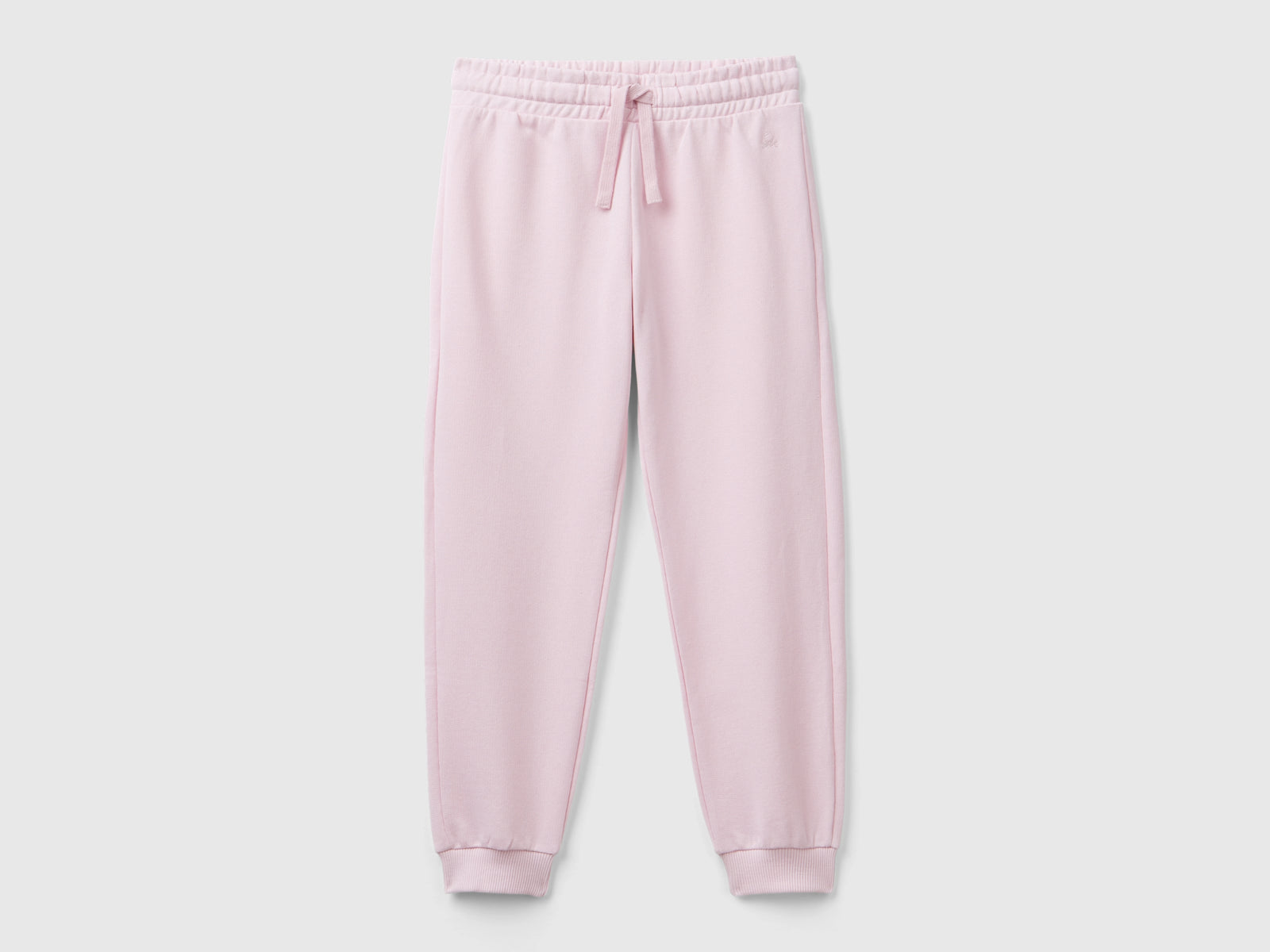 Pantaloni in felpa con logo da bambina rosa | Benetton Outlet