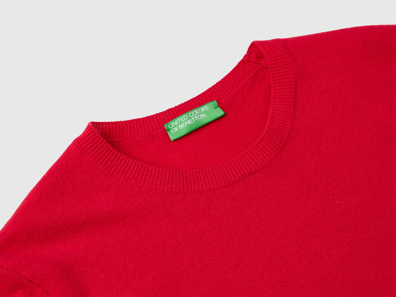 Plum crew-neck sweater in pure Merino wool da donna rosso 3 | Benetton Outlet