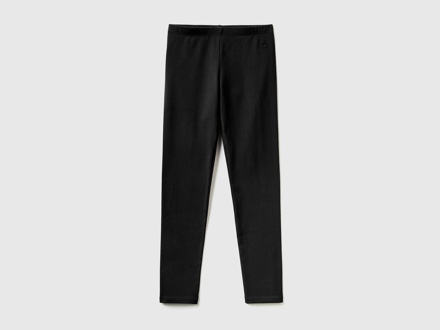 Leggings in cotone stretch da bambina nero | Benetton Outlet