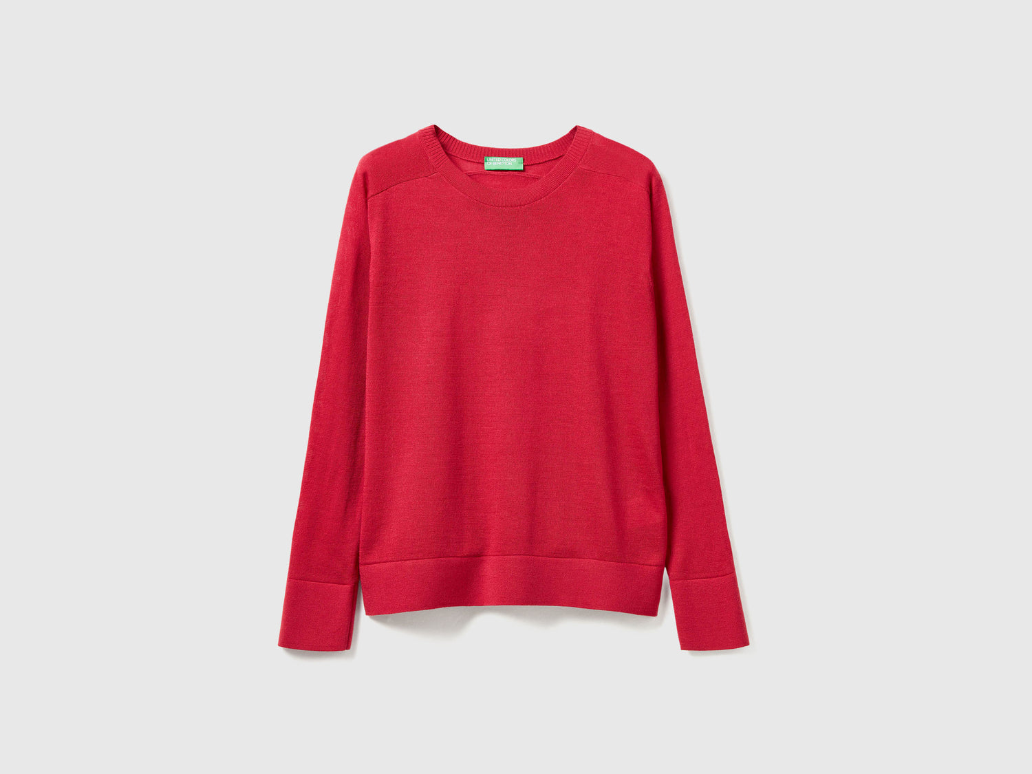 Maglia in pura lana Merino da donna fragola | Benetton Outlet