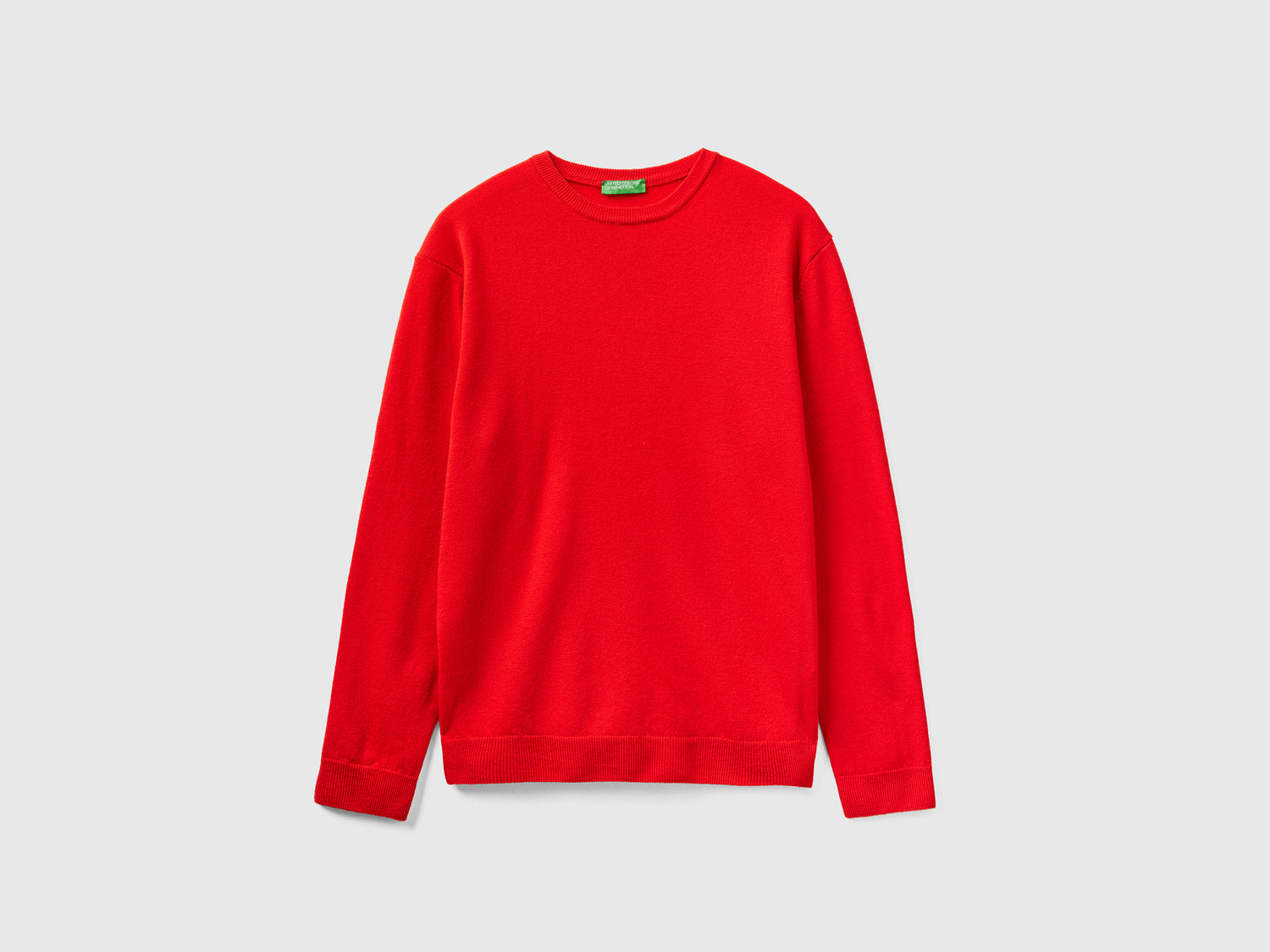 Maglia girocollo in pura lana Merino da uomo rosso | Benetton Outlet