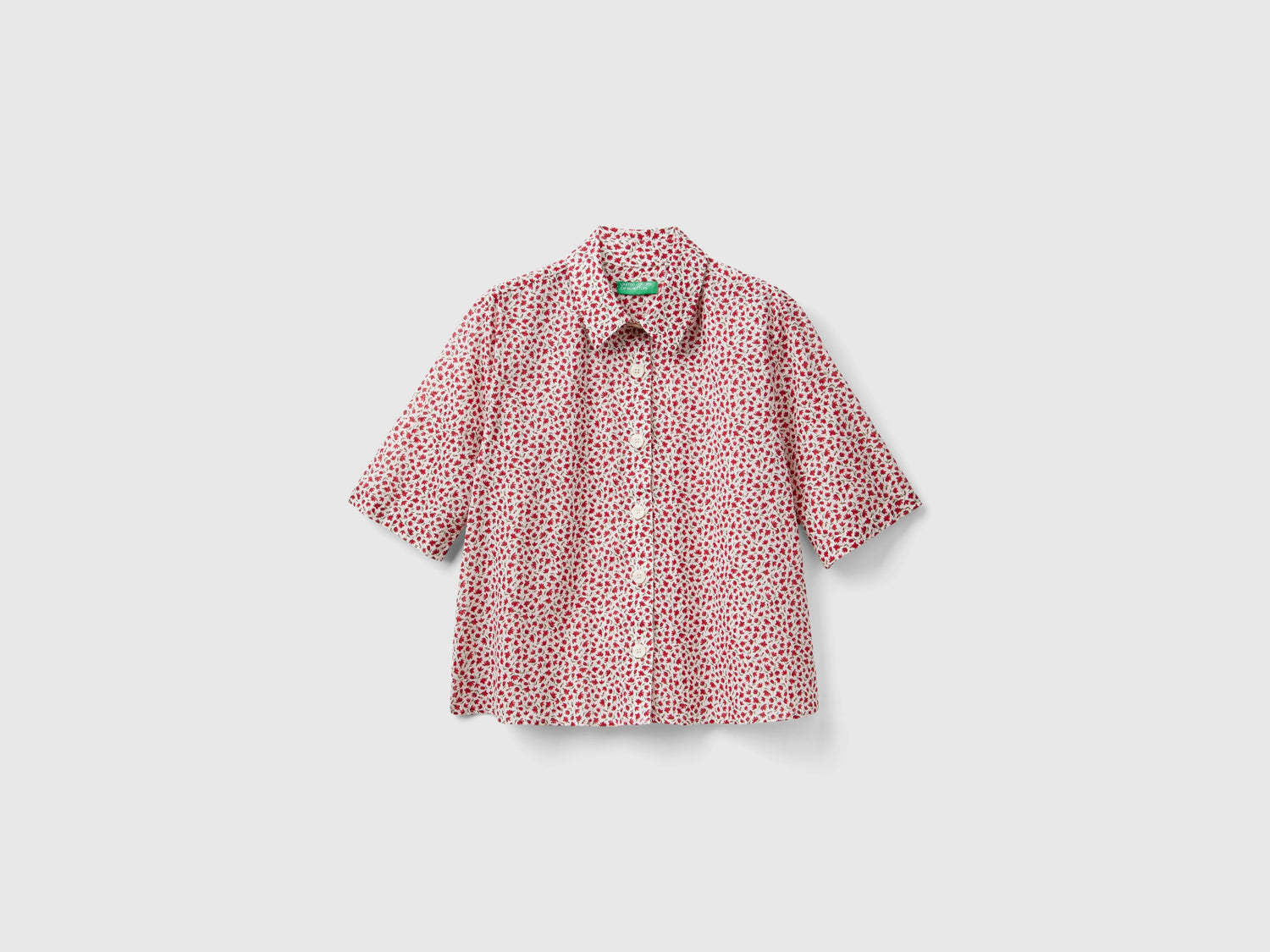 Camicia fantasia a manica corta da donna bianco panna | Benetton Outlet