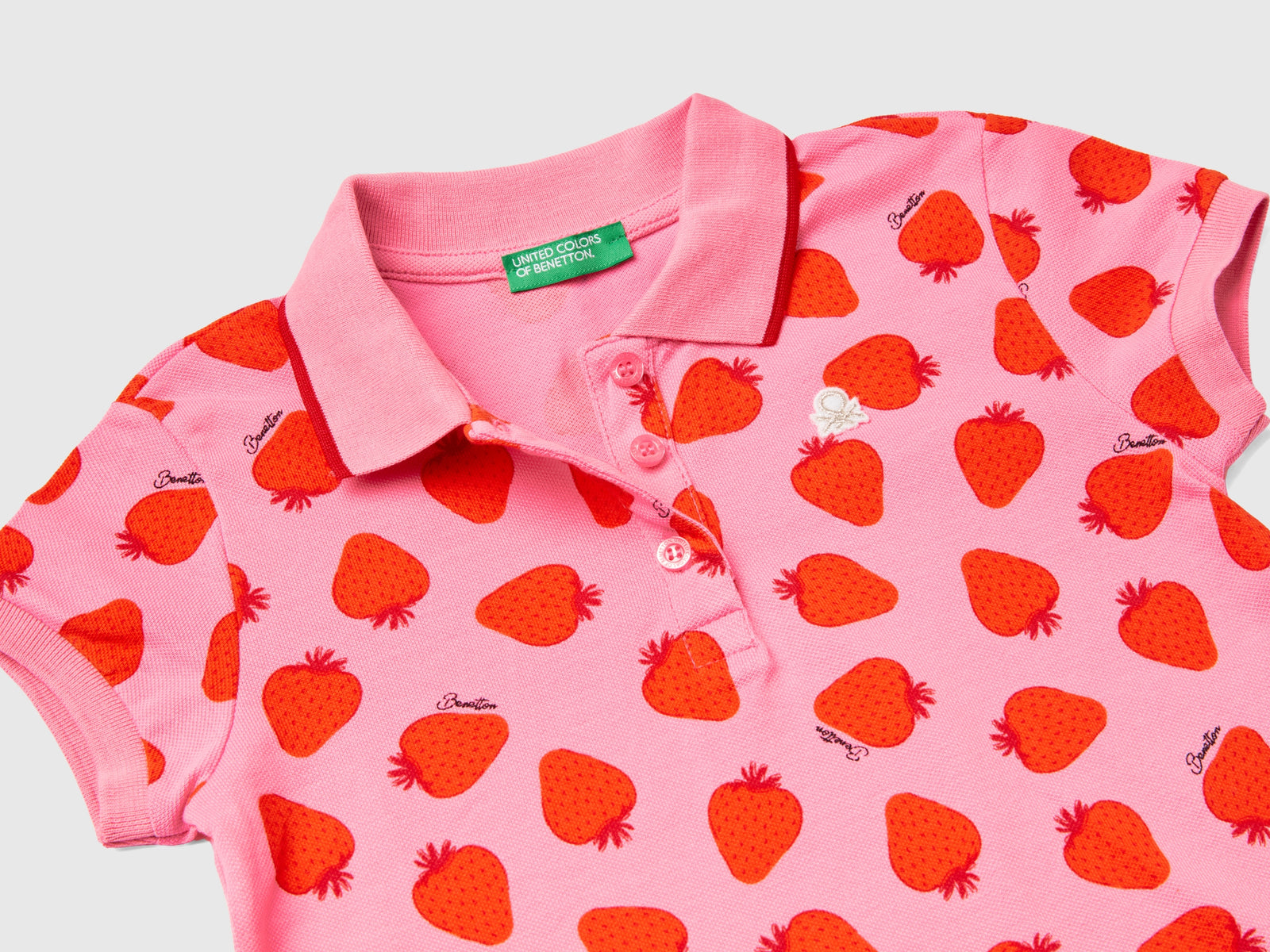 Polo con pattern fragole da bimba rosa 2 | Benetton Outlet