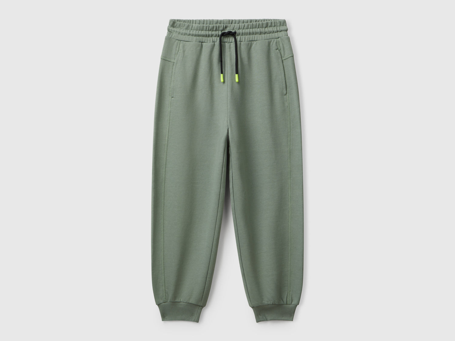 Pantaloni in felpa con stampa graffiti da bambino verde militare | Benetton Outlet