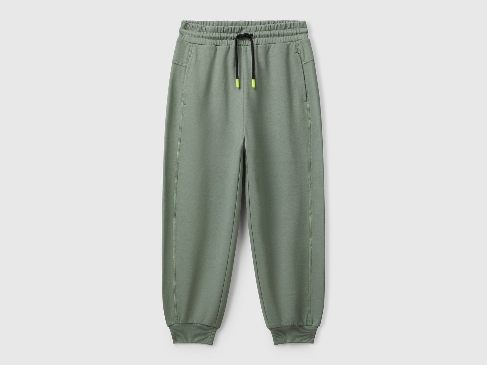 Pantaloni in felpa con stampa graffiti da bambino verde militare | Benetton Outlet