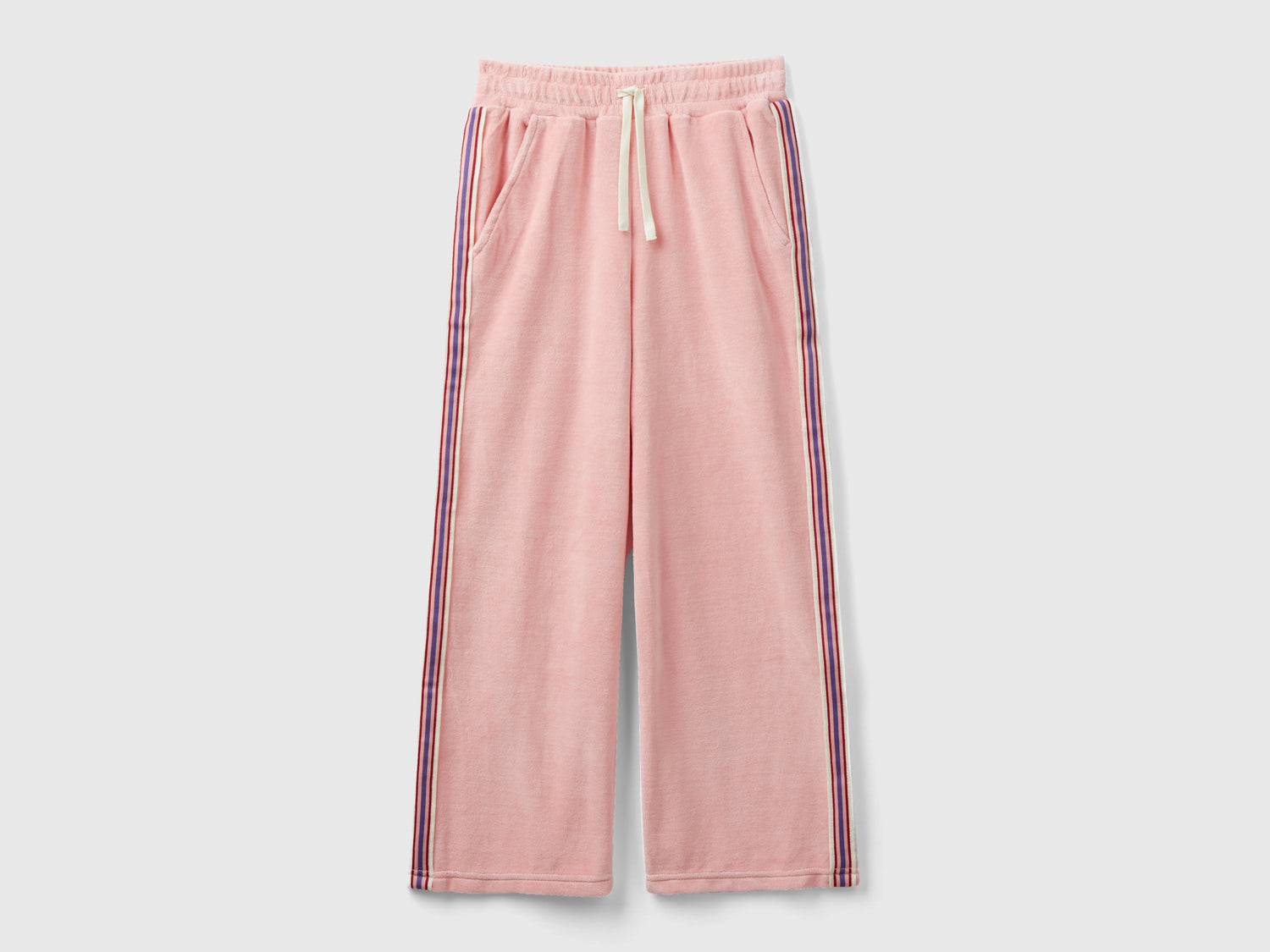 Pantaloni in ciniglia con bande rigate da bambina rosa | Benetton Outlet