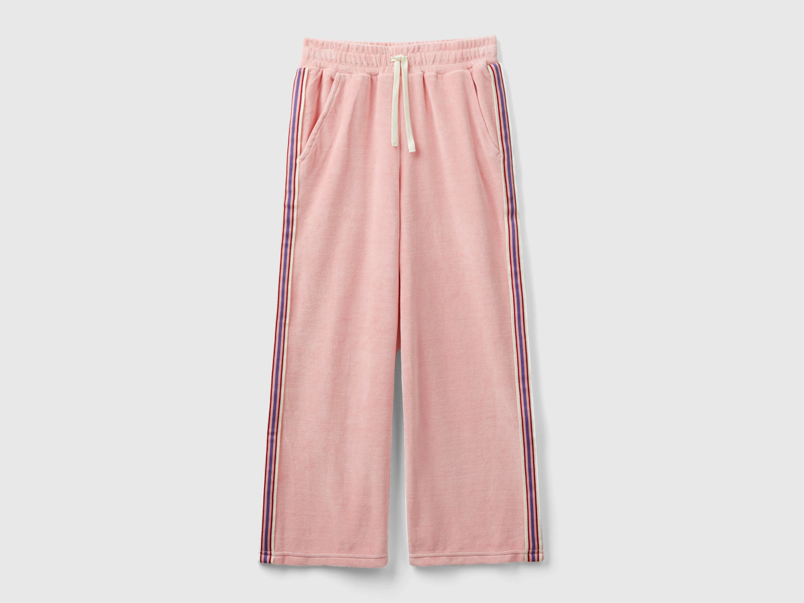 Pantaloni in ciniglia con bande rigate da bambina rosa | Benetton Outlet