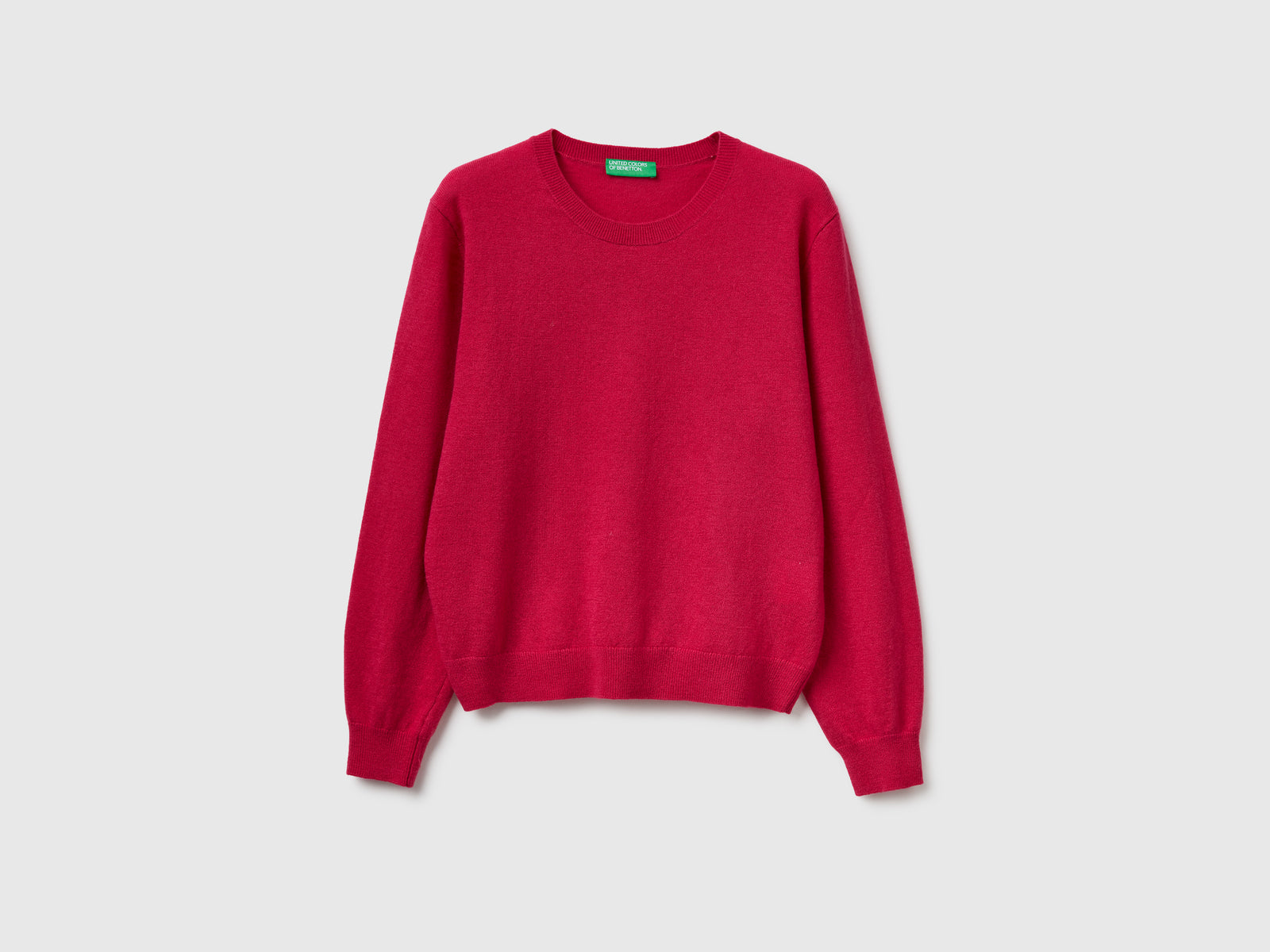 Maglia relaxed fit in pura lana Merino da donna ciclamino | Benetton Outlet