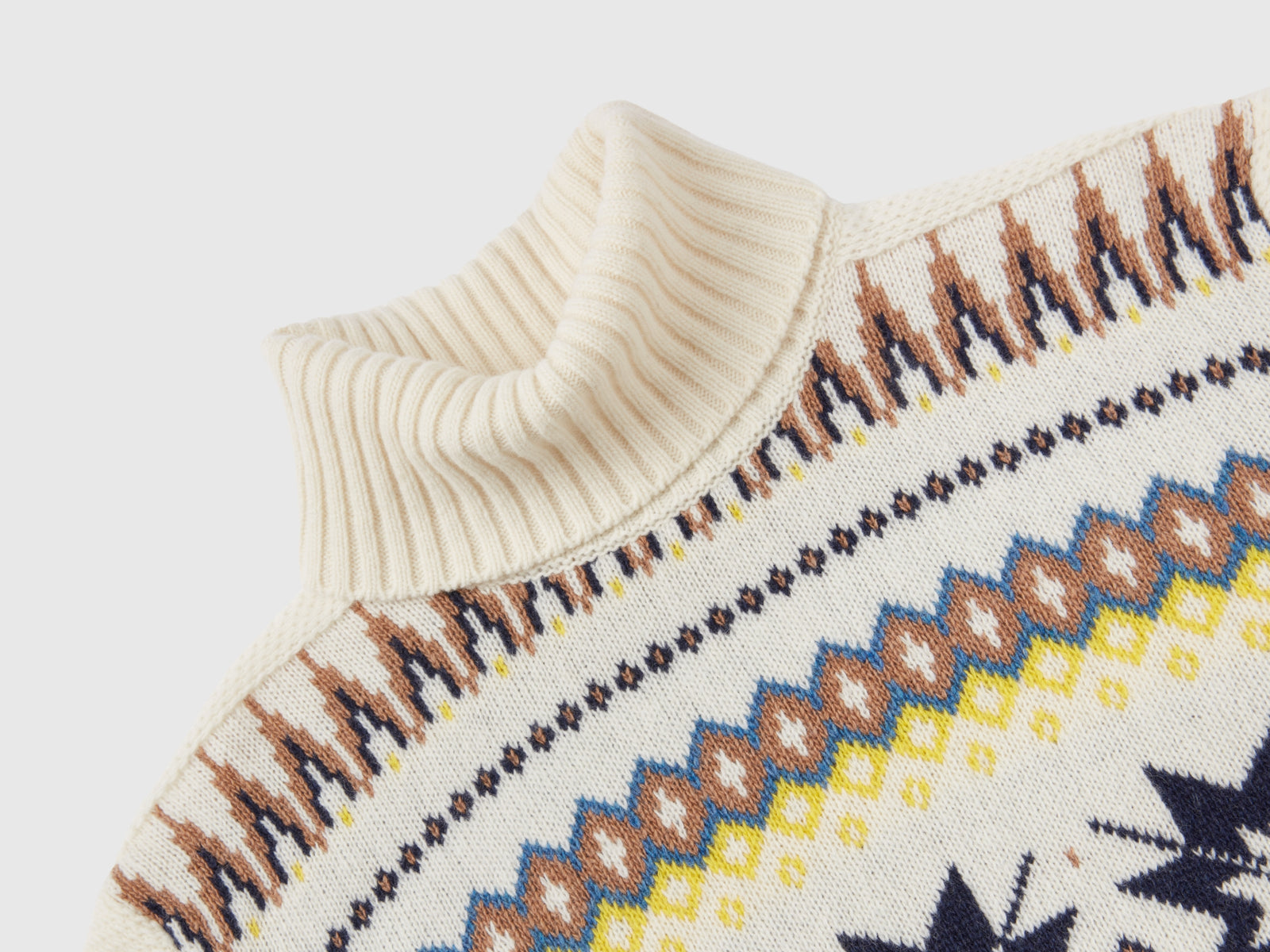 Dolcevita con motivi geometrici da donna bianco panna 3 | Benetton Outlet