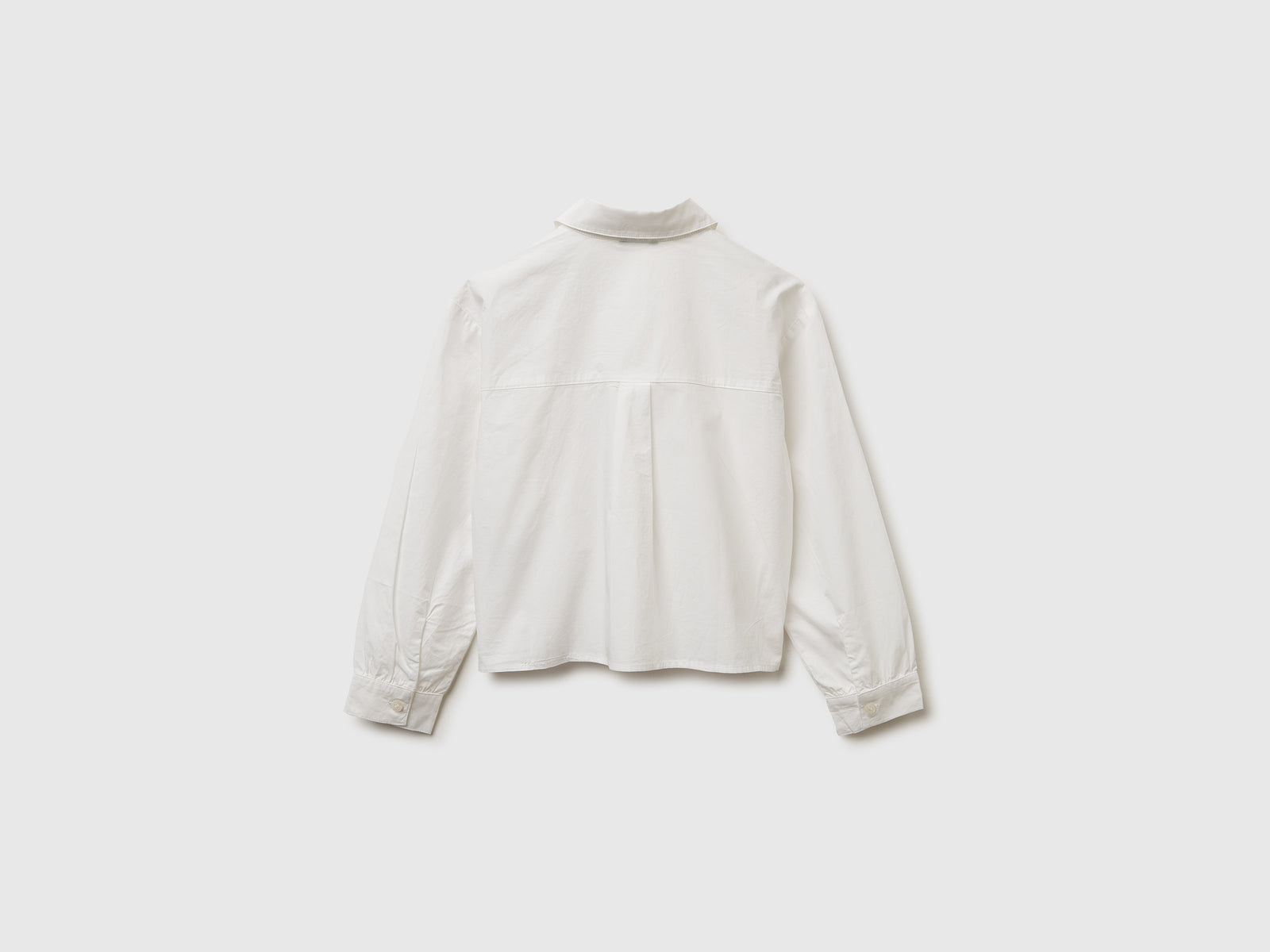 Camicia con applicazioni effetto gioiello da bambina bianco panna 2 | Benetton Outlet