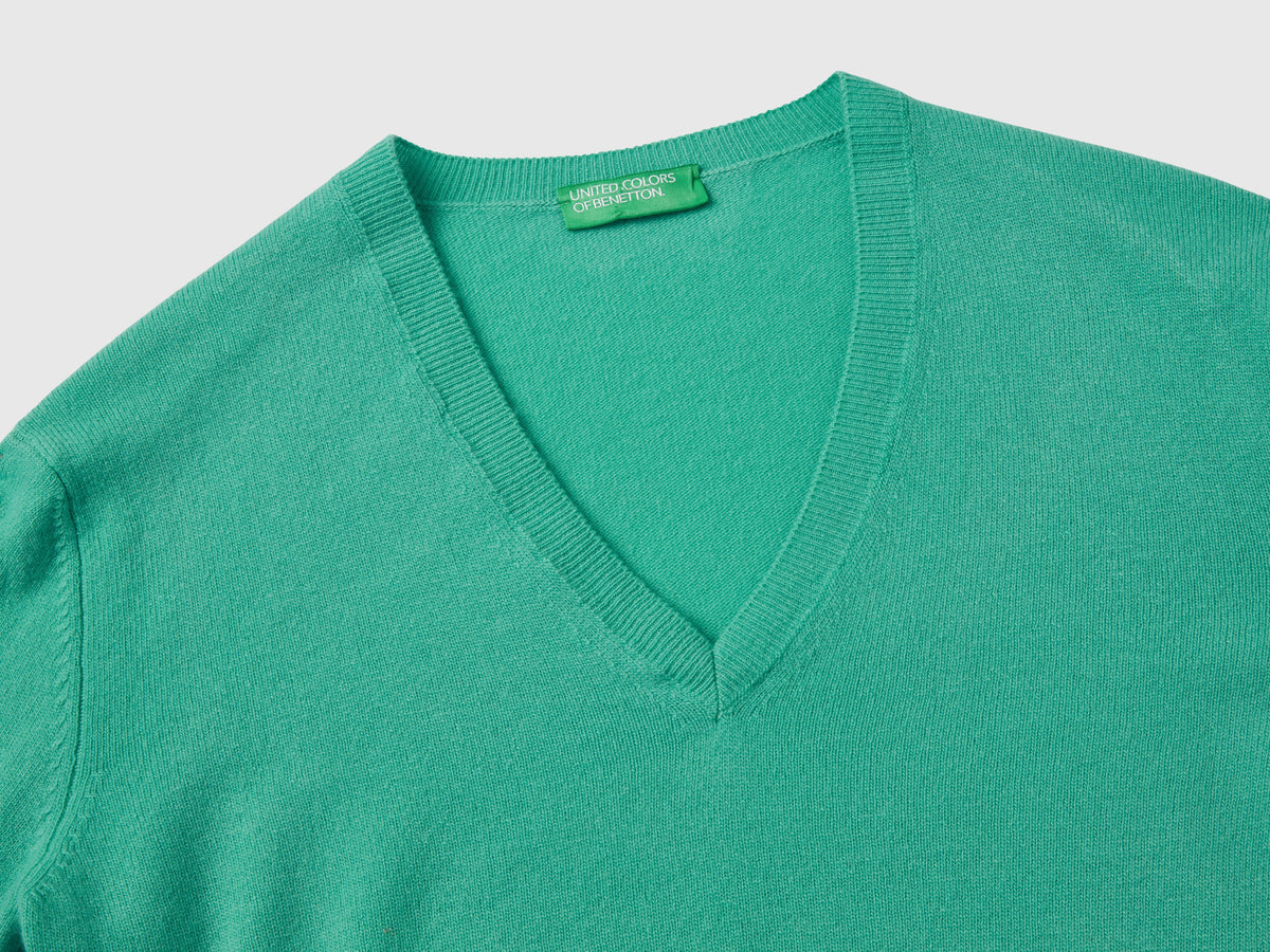 Maglia con scollo a V chiaro in pura lana Merino