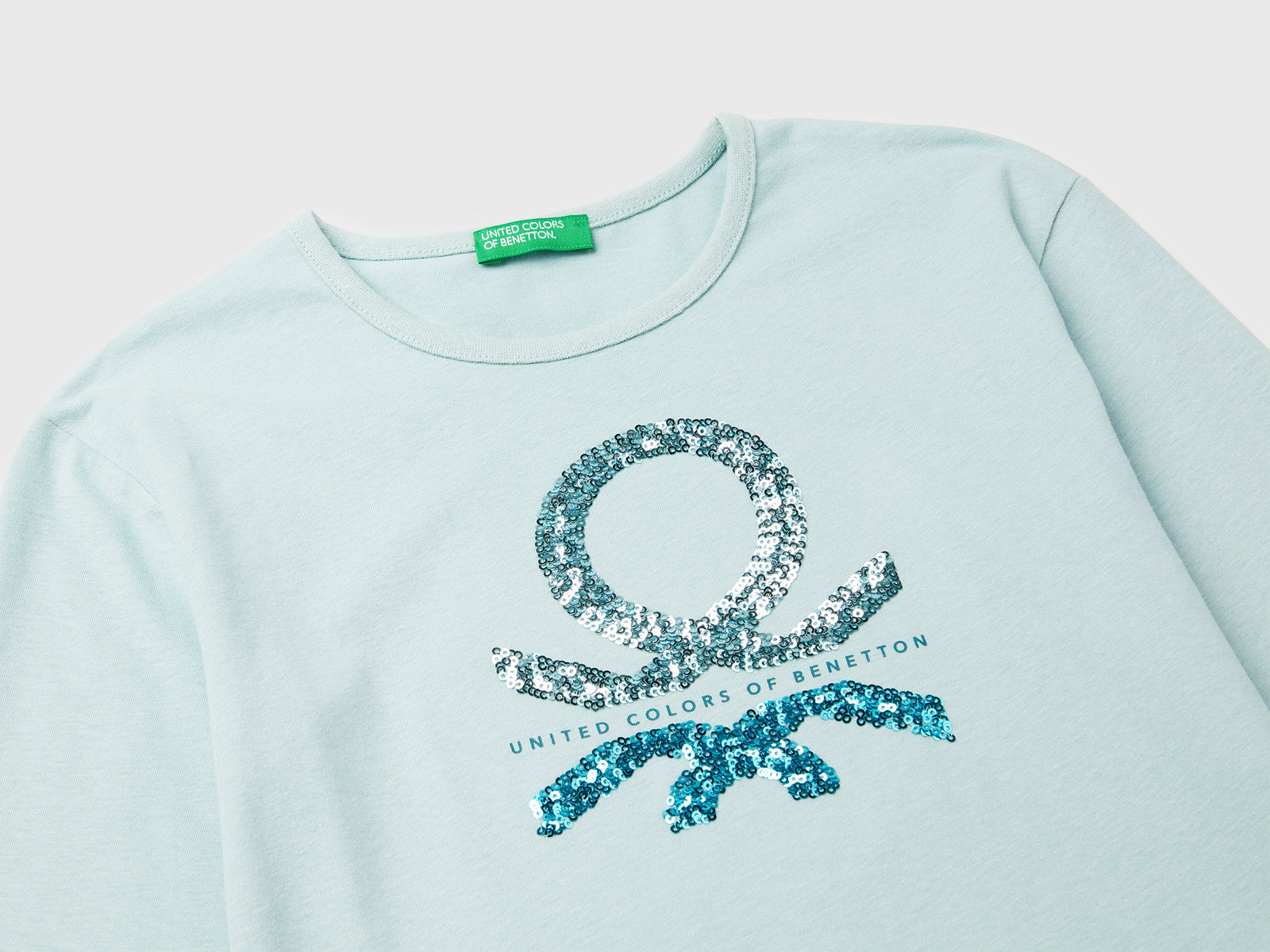 T-shirt in caldo cotone con paillettes da bambina verde acqua 3 | Benetton Outlet