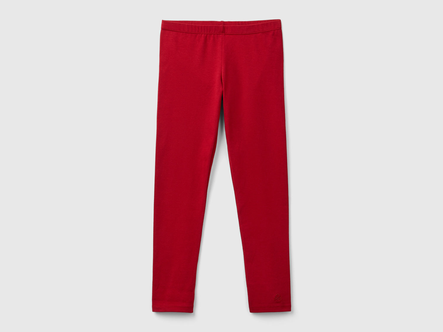 Leggings in cotone stretch con logo da bambina rosso | Benetton Outlet