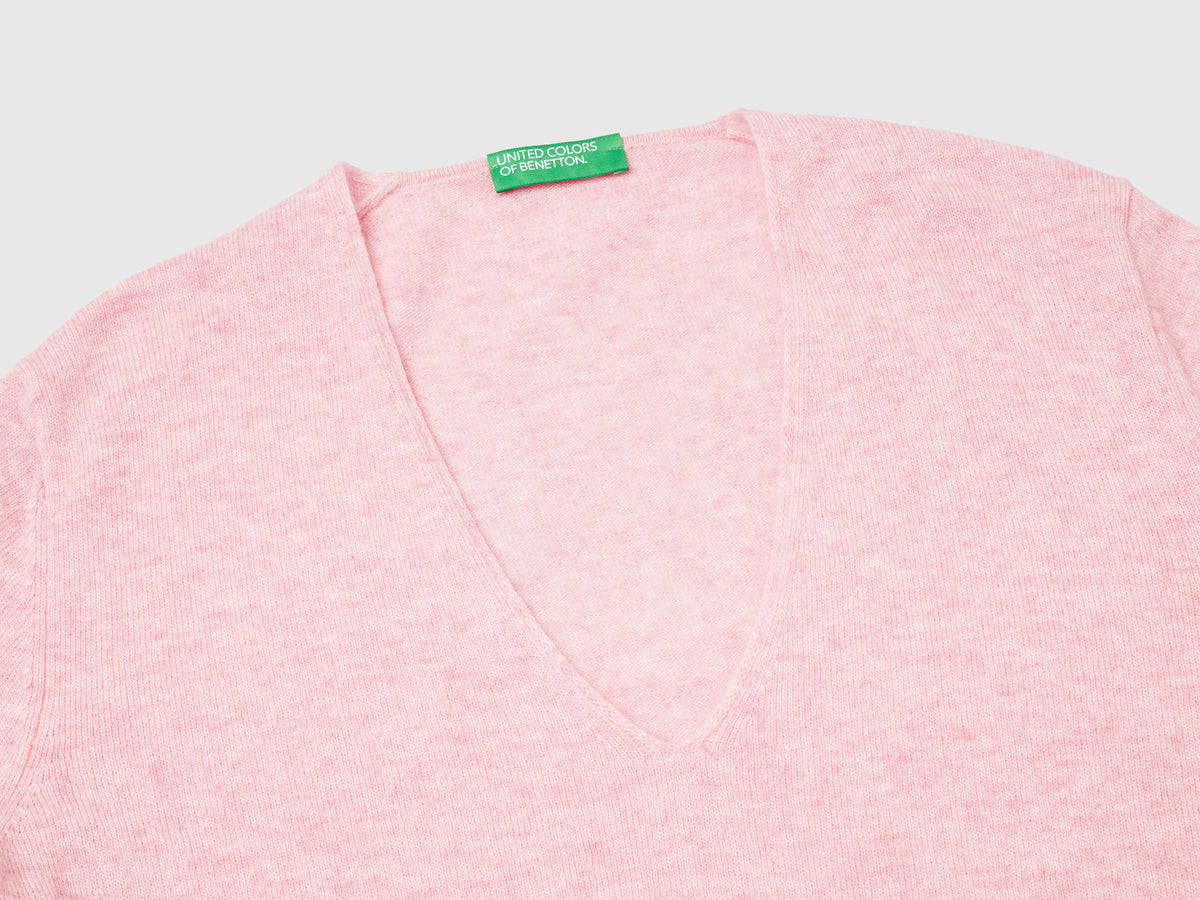 Maglione con scollo a V in pura lana Merino