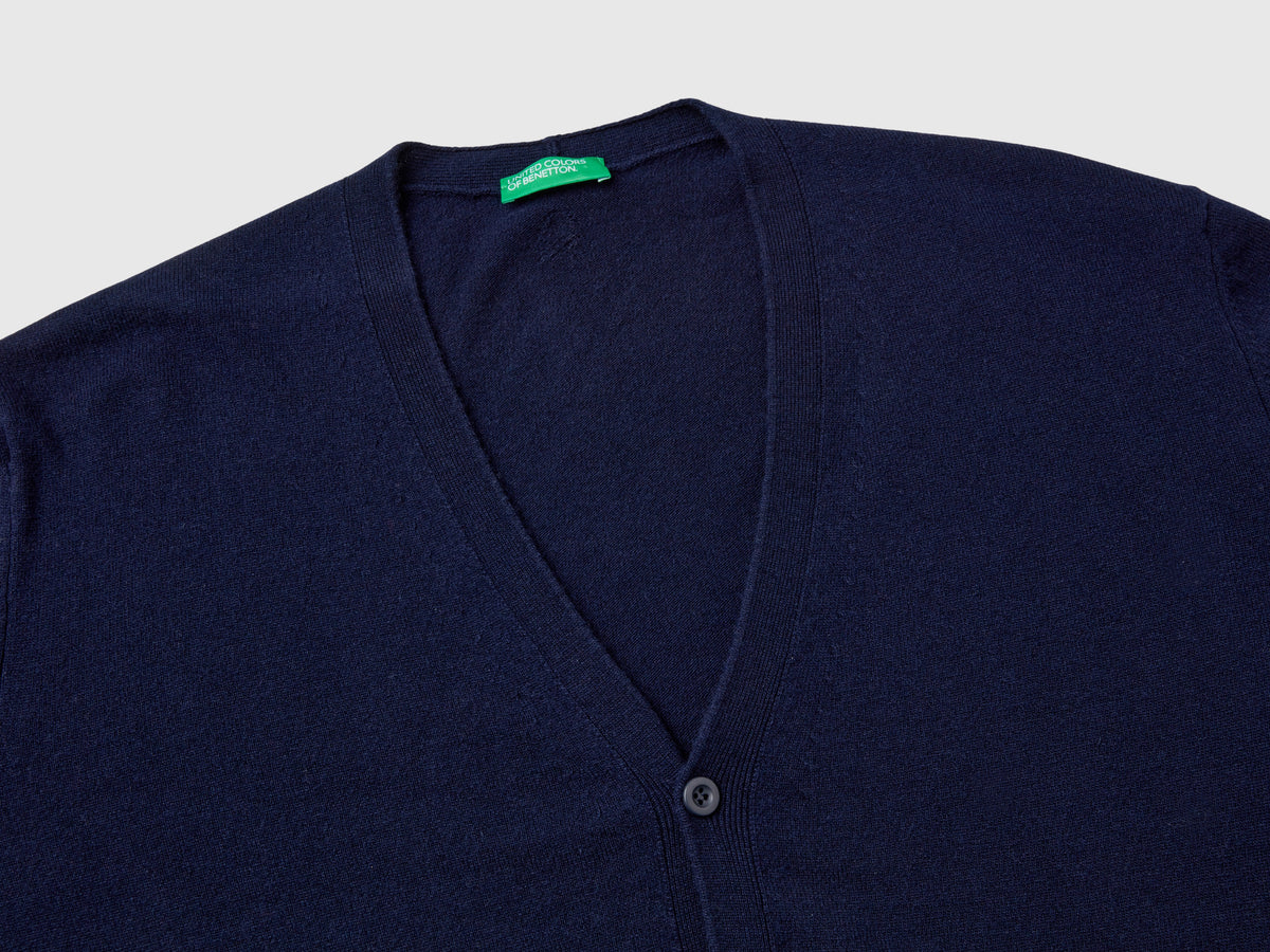 Cardigan blu notte scollo a V in pura lana Merino