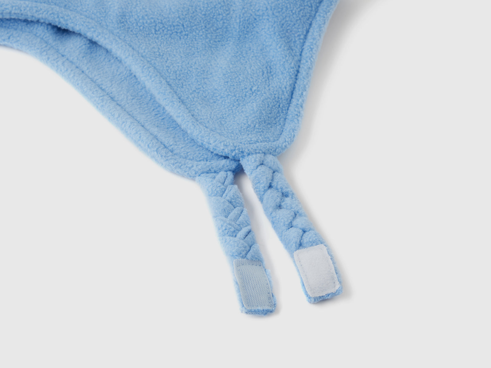 Cappello con paraorecchie e pom pom da bimbo blu 2 | Benetton Outlet
