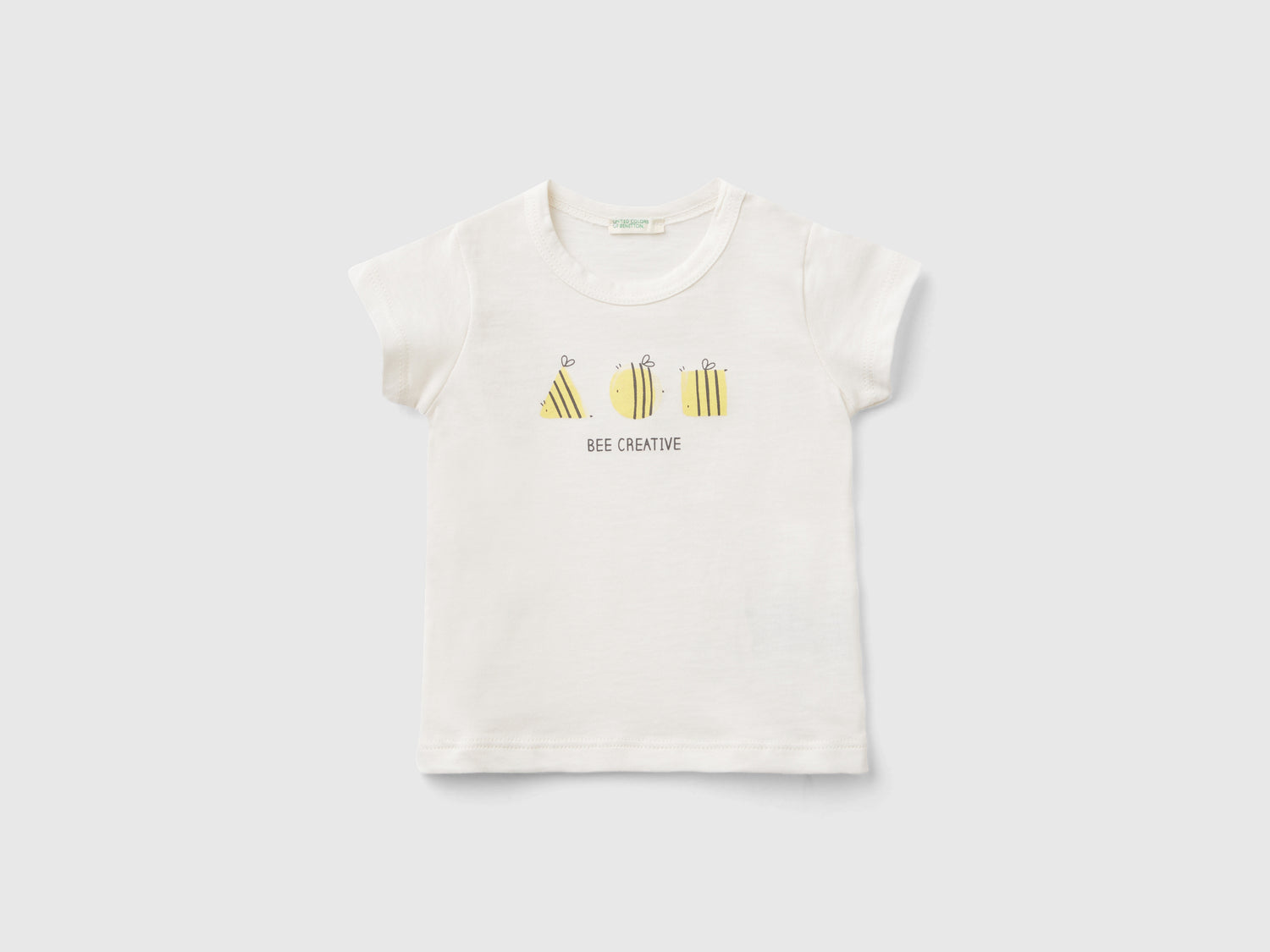 T-shirt manica corta 100% cotone bio da neonato bianco panna | Benetton Outlet