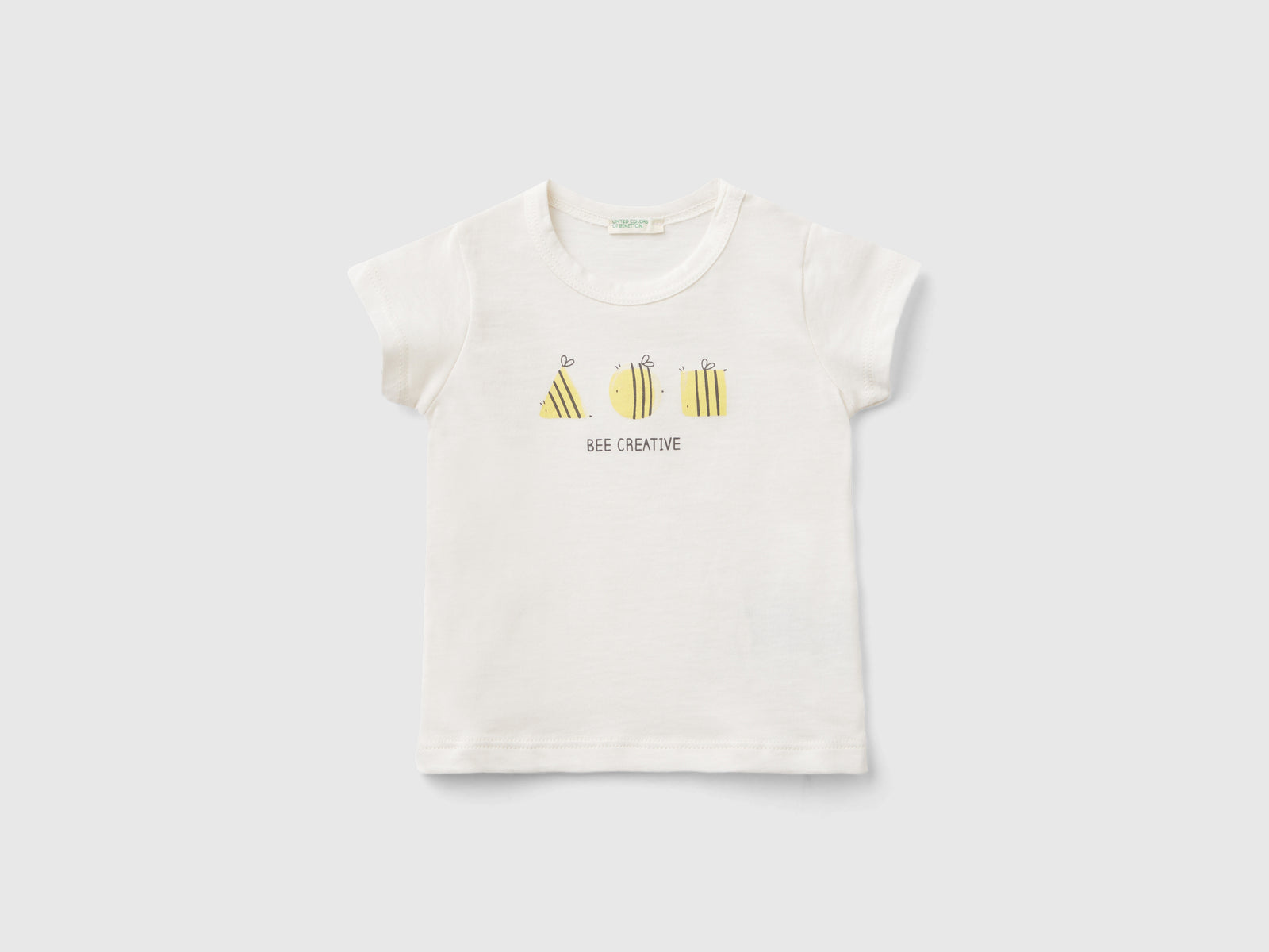 T-shirt manica corta 100% cotone bio da neonato bianco panna | Benetton Outlet
