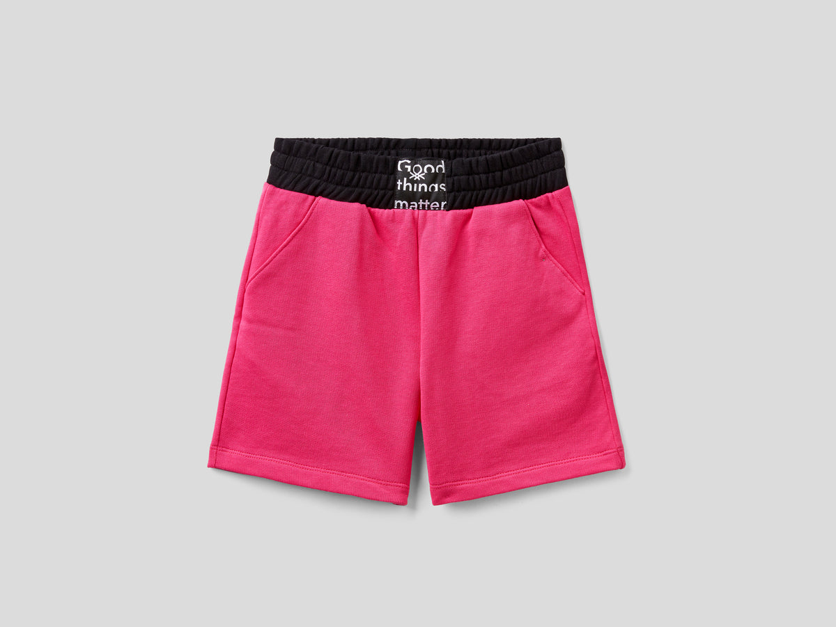 Bermuda in felpa con elastico da bambina fucsia | Benetton Outlet