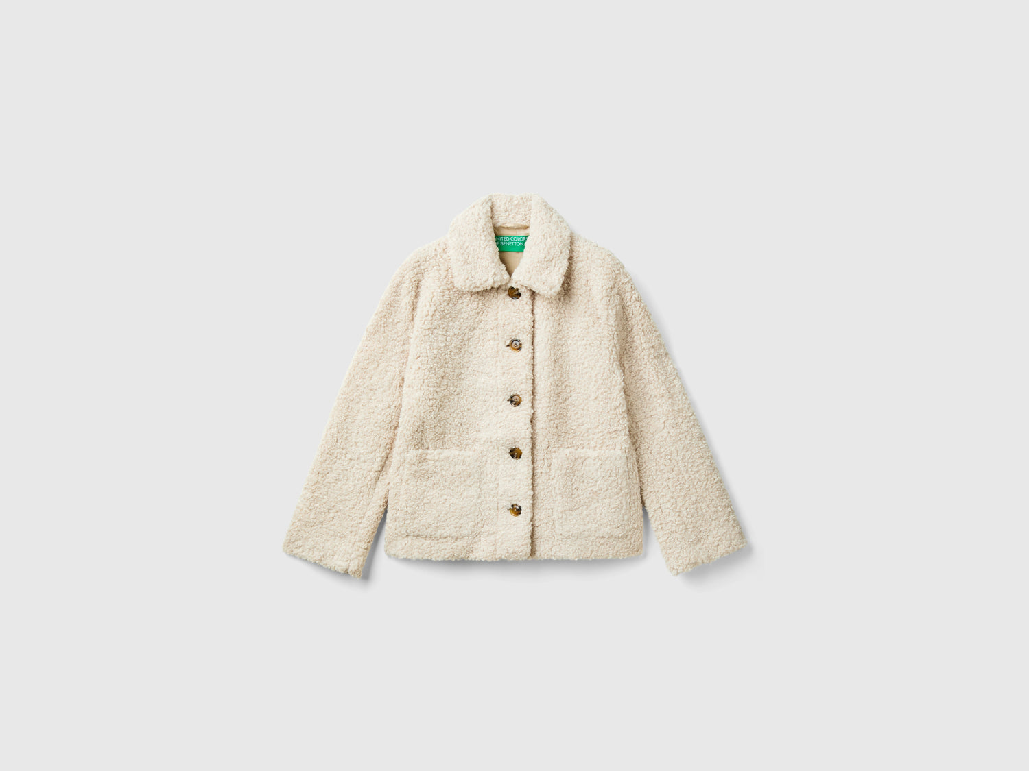 Giubbino in pelliccetta sintetica da donna beige | Benetton Outlet