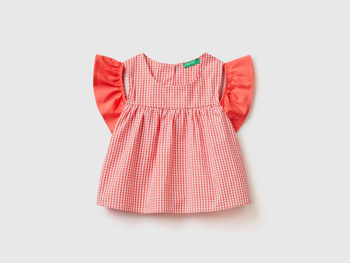 Blusa svasata in puro cotone tinto filo a quadri vichy