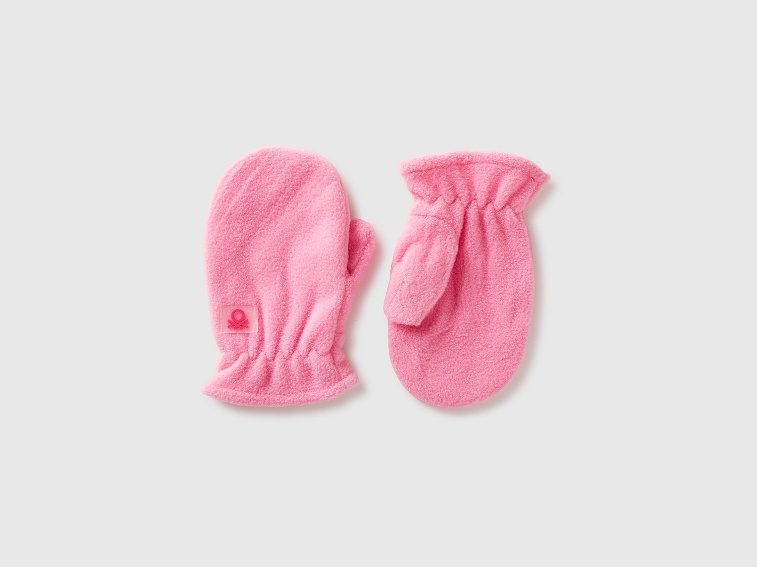 Muffole in pile foderate da bimbo rosa | Benetton Outlet