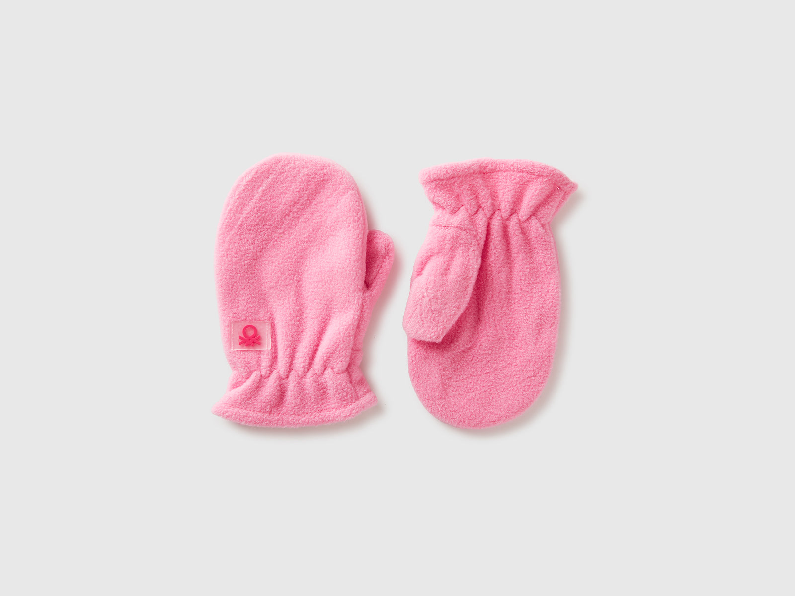 Muffole in pile foderate da bimbo rosa | Benetton Outlet