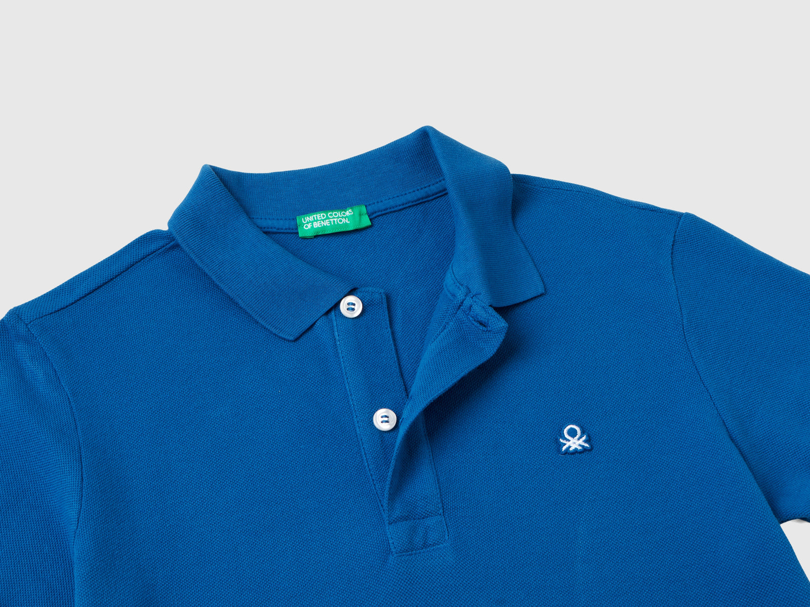 Polo slim fit 100% cotone bio da bambino bluette 3 | Benetton Outlet