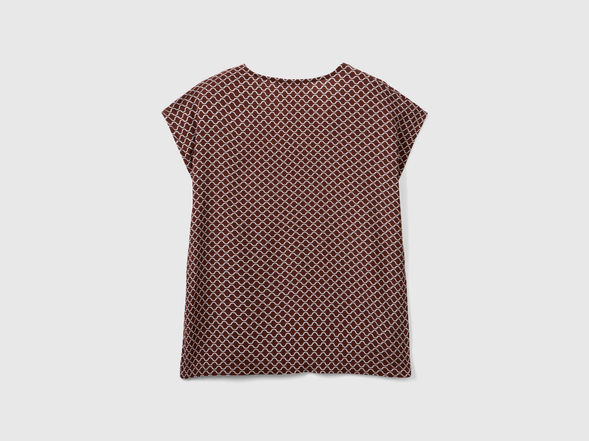Blusa smanicata stampata