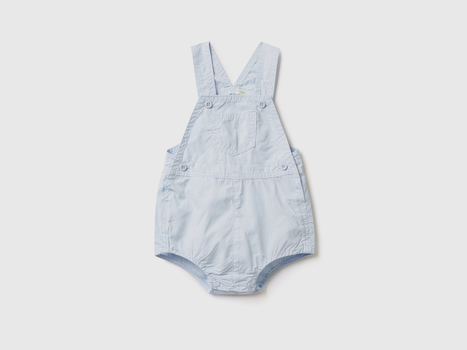 Pagliaccetto salopette in 100% cotone da neonato celeste | Benetton Outlet