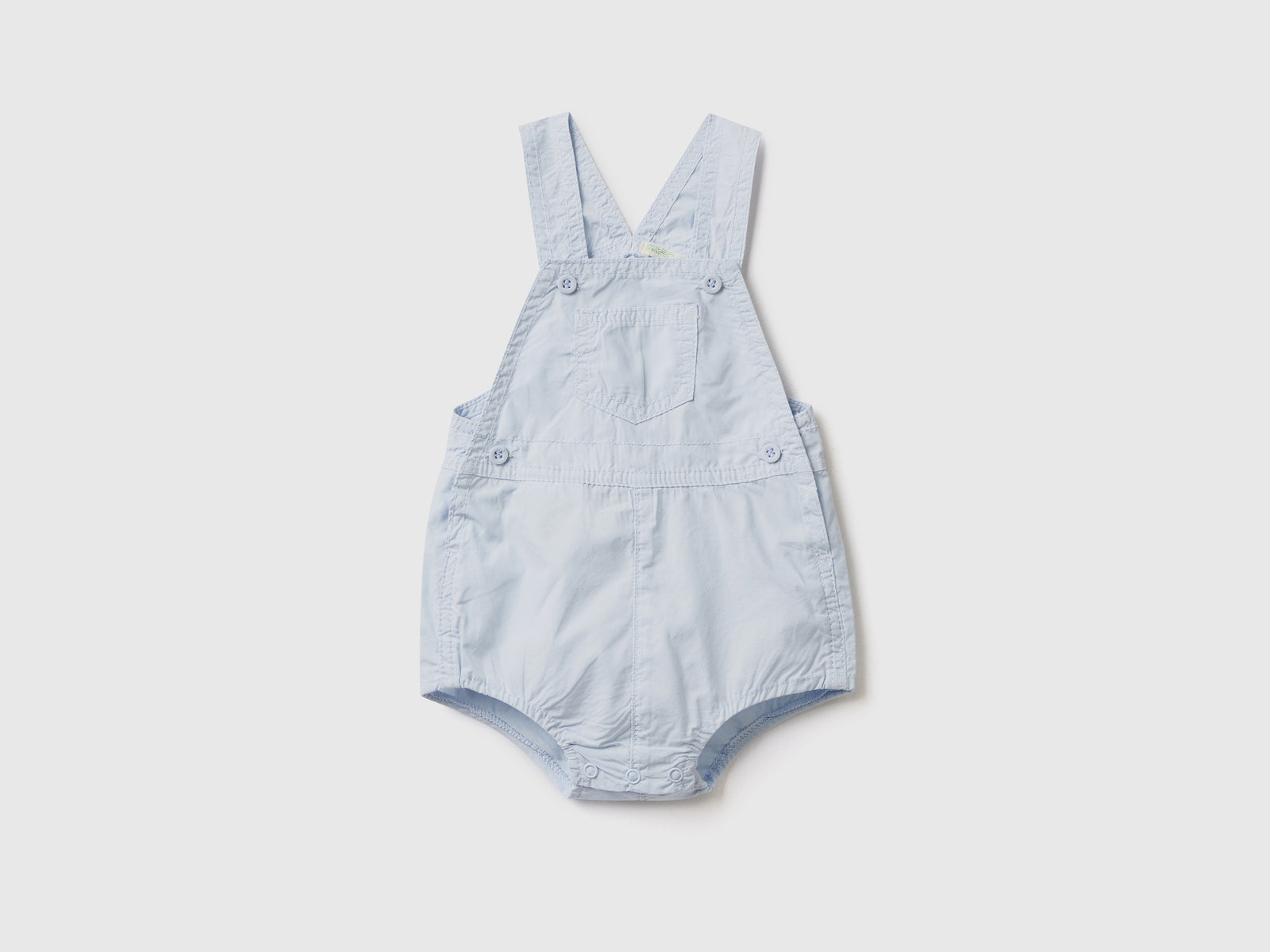 Pagliaccetto salopette in 100% cotone da neonato celeste | Benetton Outlet