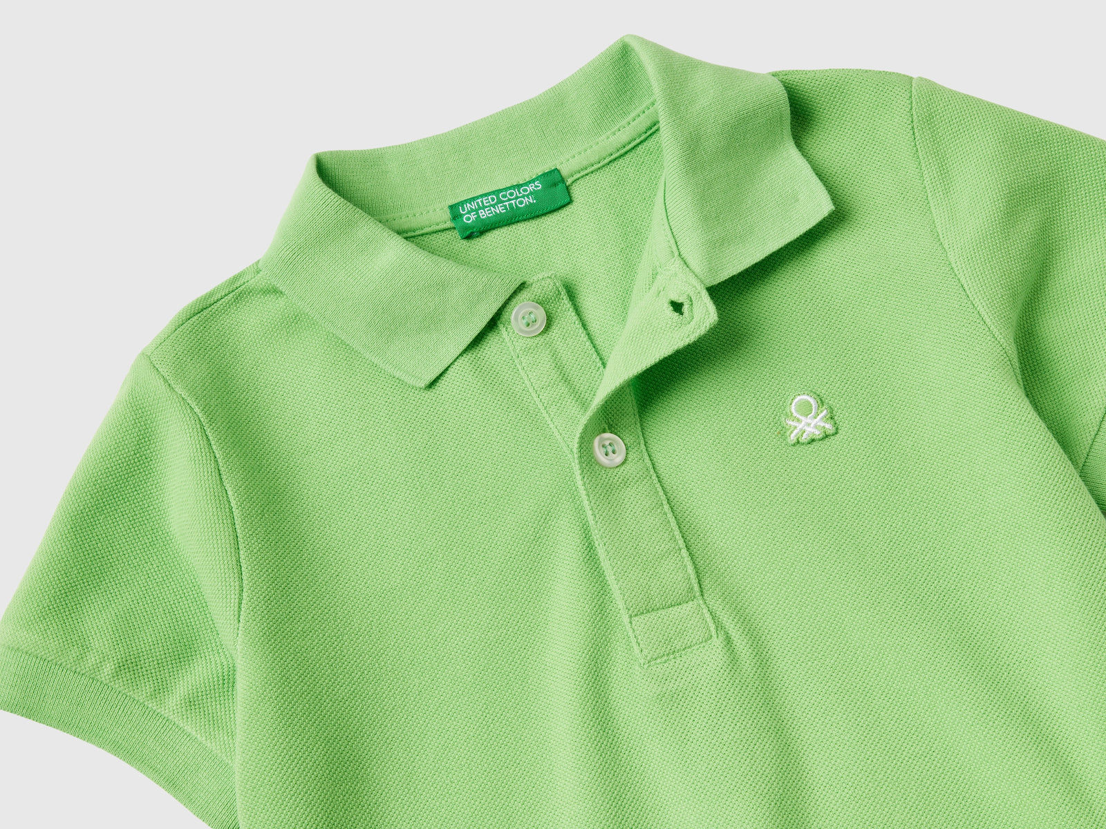 Polo manica corta in cotone biologico da bimbo verde chiaro 2 | Benetton Outlet