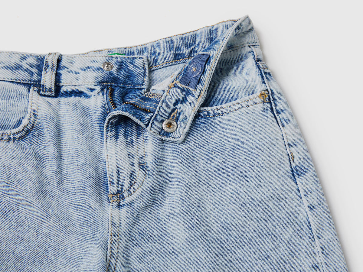 Pantaloni lunghi baggy fit in denim di puro cotone con rotture