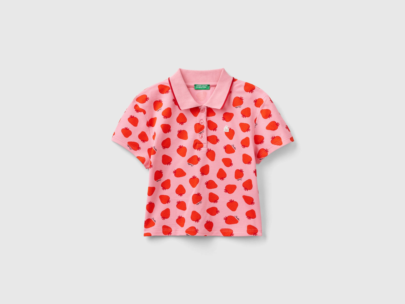 Polo con pattern fragole da bambina rosa | Benetton Outlet
