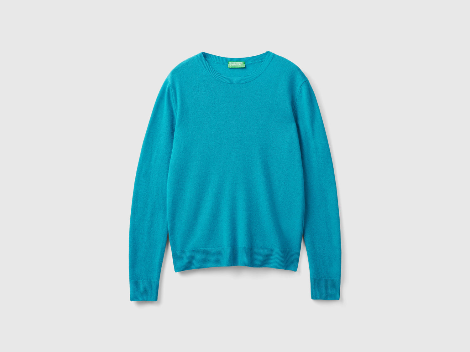 Maglia girocollo in pura lana Merino da donna turchese | Benetton Outlet