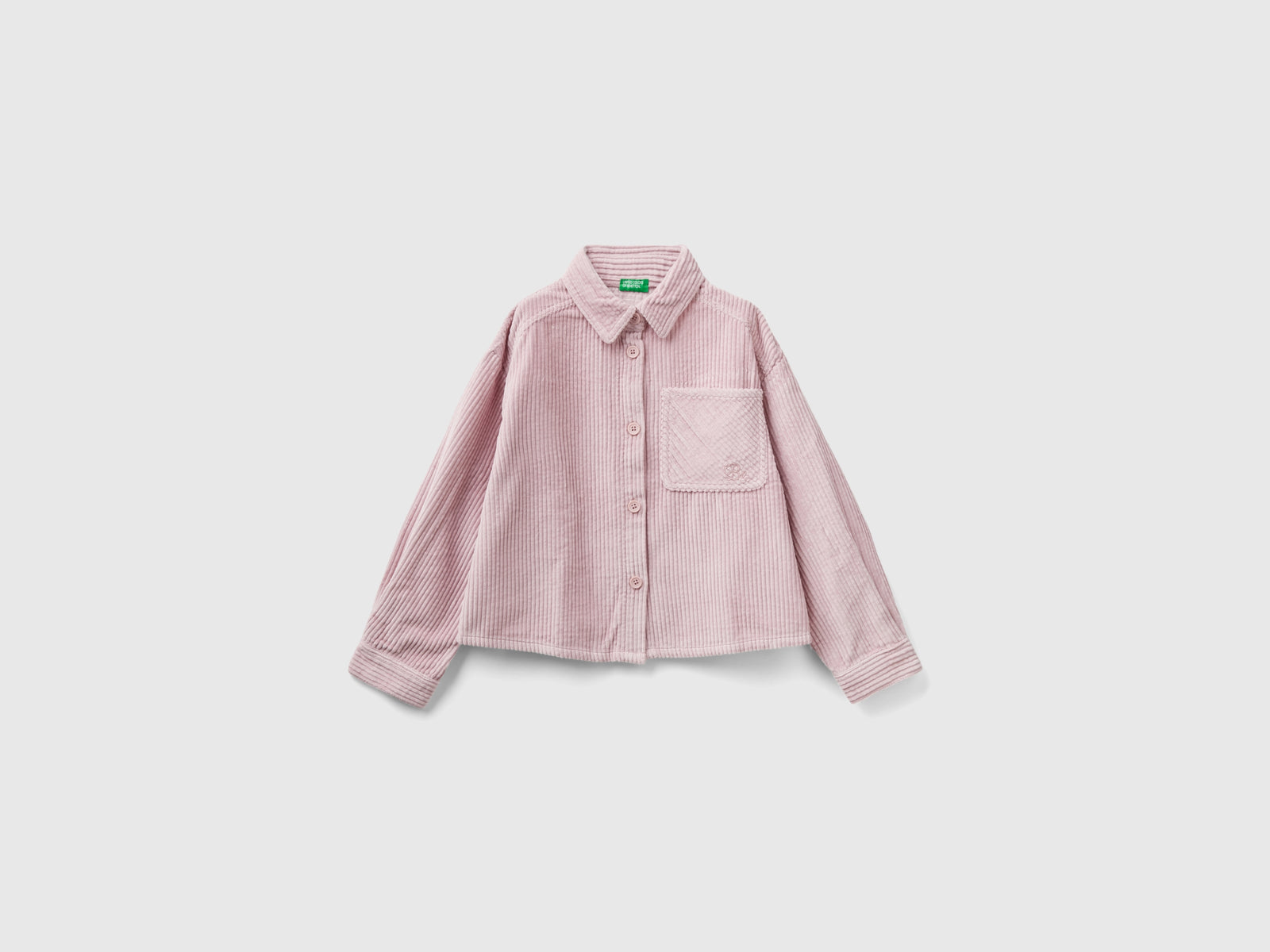 Camicia over fit in velluto da bambina rosa | Benetton Outlet