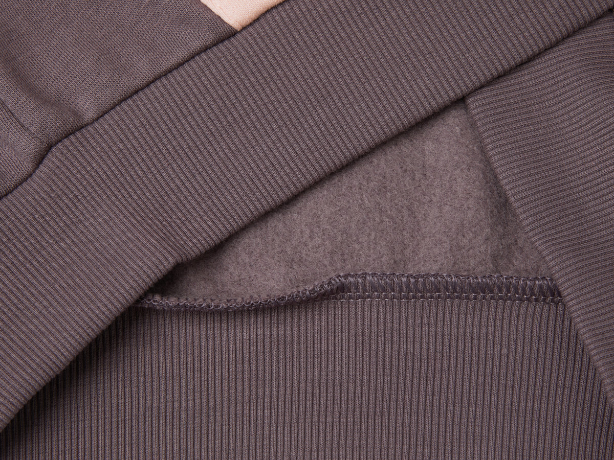 Sudadera con cremallera y lentejuelas