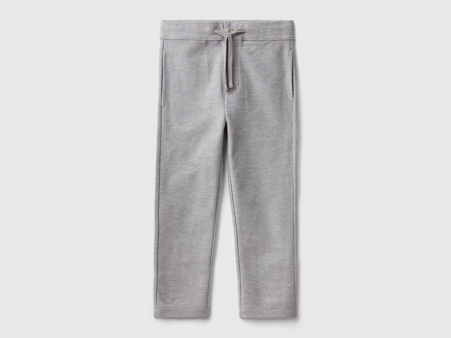 Pantaloni in felpa 100% cotone da bambino grigio chiaro | Benetton Outlet