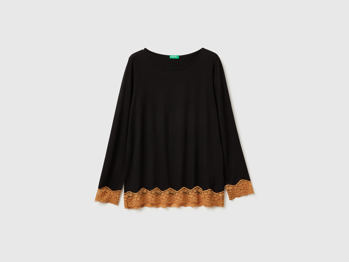 Maglia fluida con pizzo