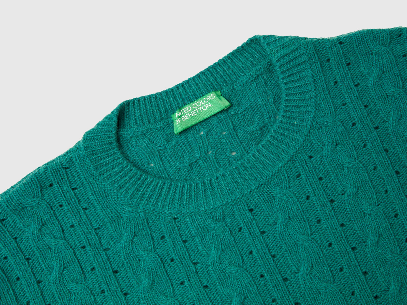 Maglia cropped con trecce e trafori da donna verde scuro 3 | Benetton Outlet
