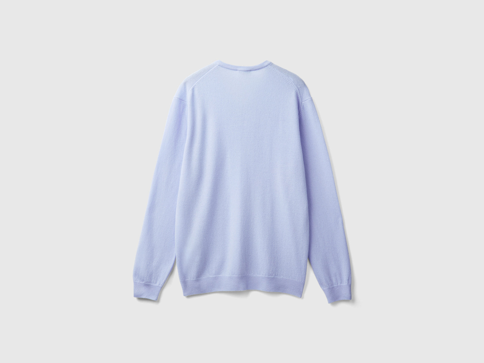 Maglia scollo a V carta da zucchero in pura lana Merino da uomo azzurro 2 | Benetton Outlet