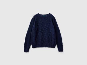 Maglione con trecce e losanghe