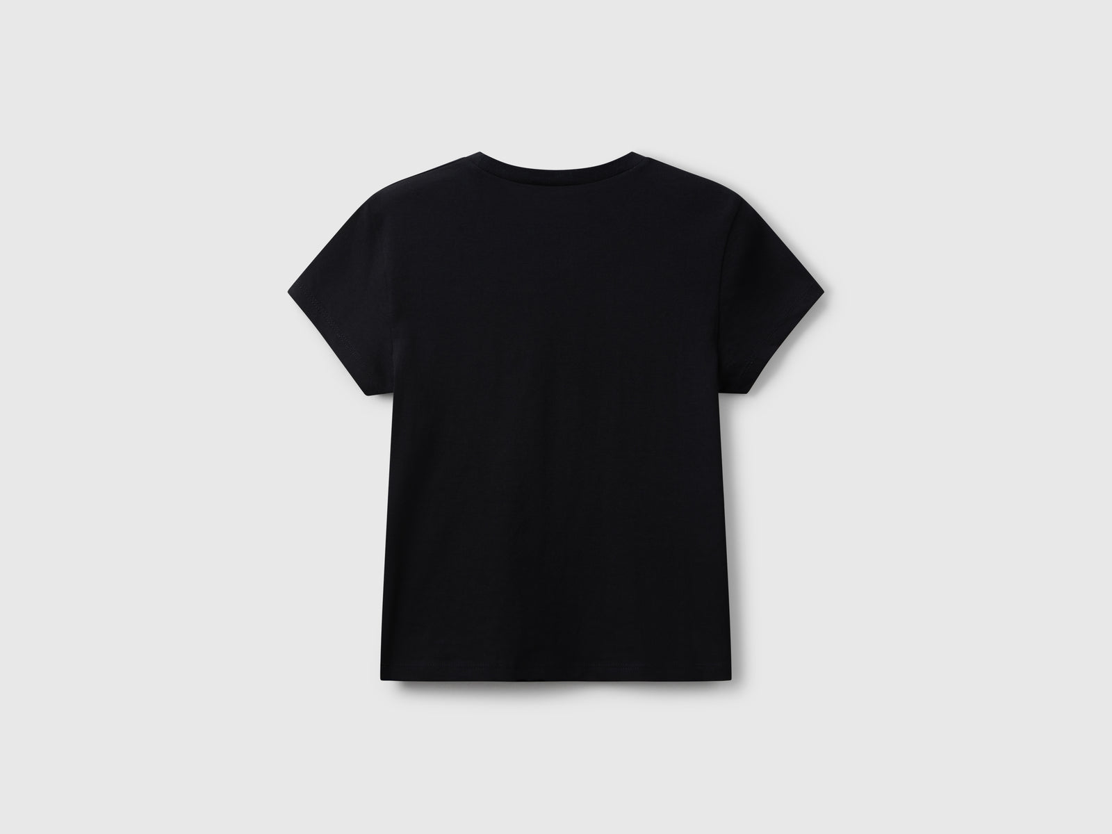 T-shirt con logo glitter da bambina nero 2 | Benetton Outlet
