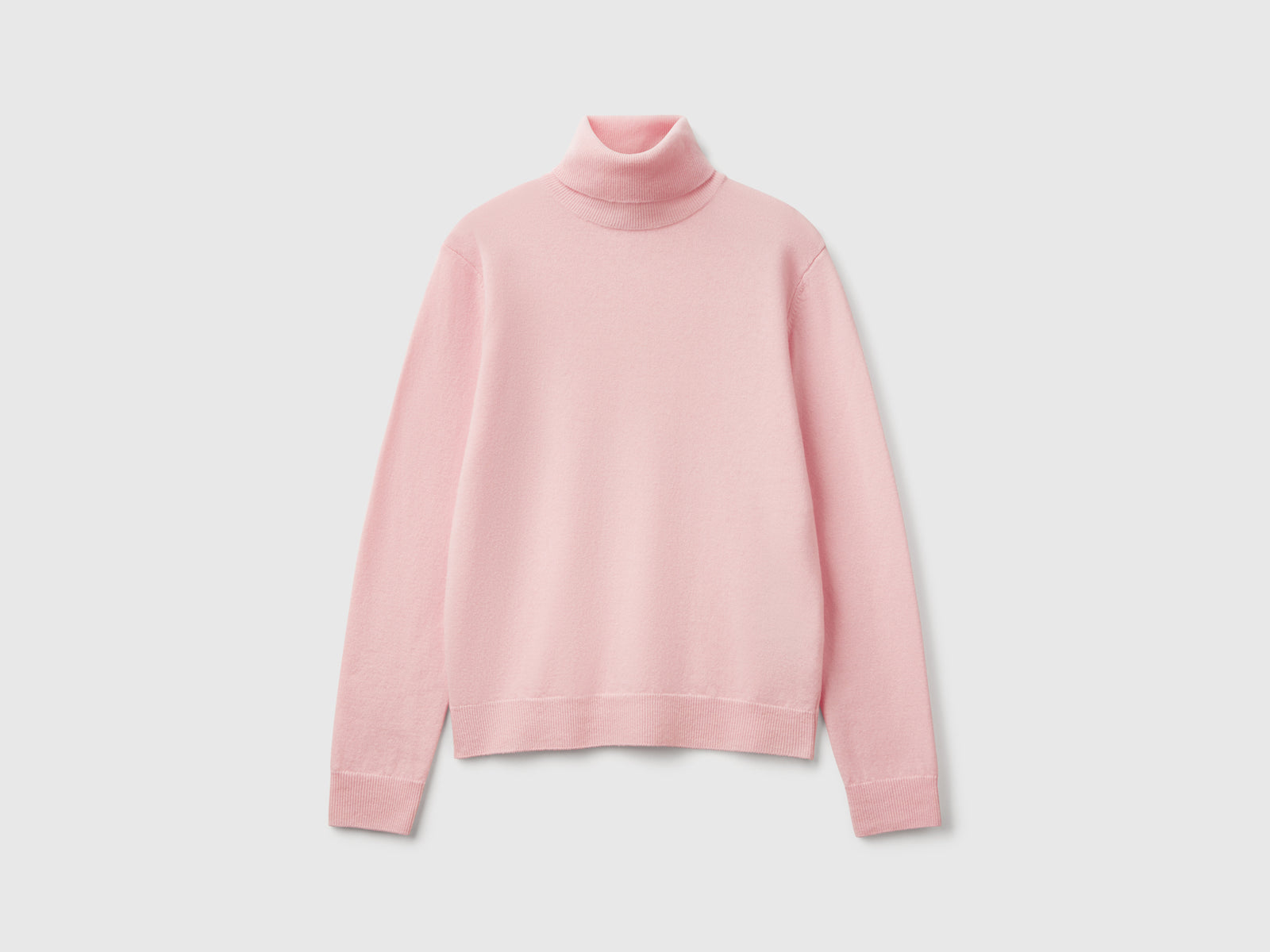 Maglione dolcevita rosa cipria in pura lana Merino da donna rosa tenue | Benetton Outlet