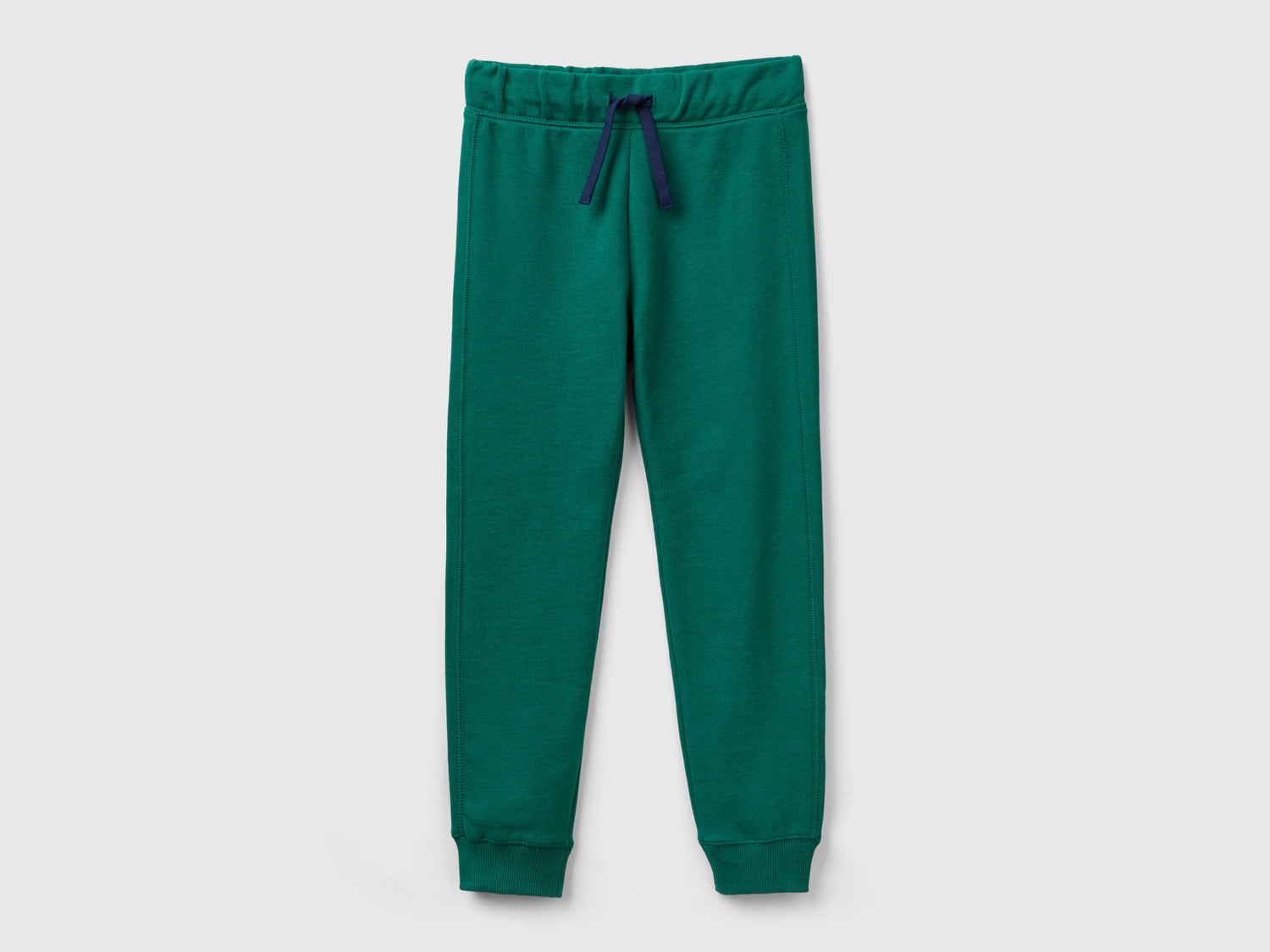 Pantaloni in felpa 100% cotone da bambino verde scuro | Benetton Outlet