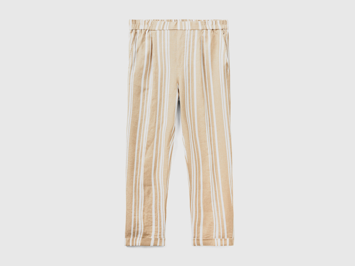 Pantaloni lunghi con stampa fantasia da donna beige | Benetton Outlet
