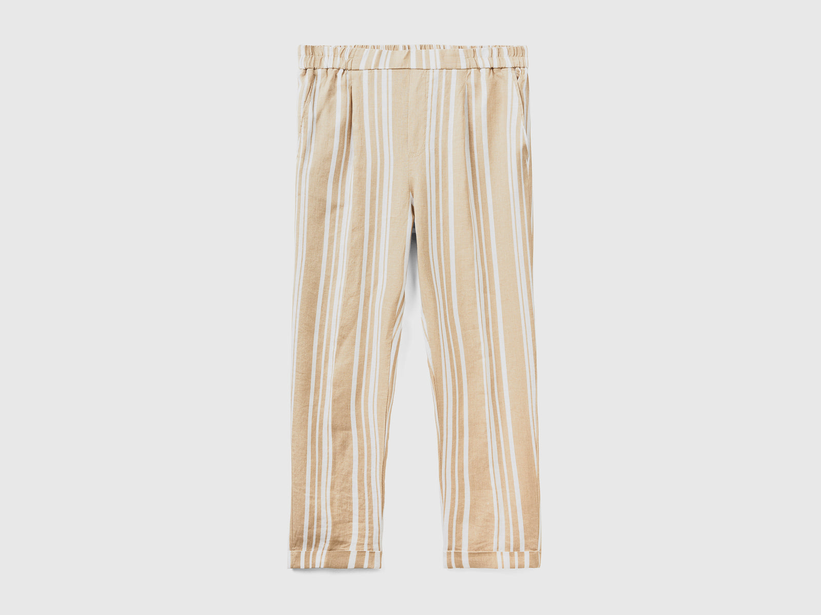 Pantaloni lunghi con stampa fantasia da donna beige | Benetton Outlet